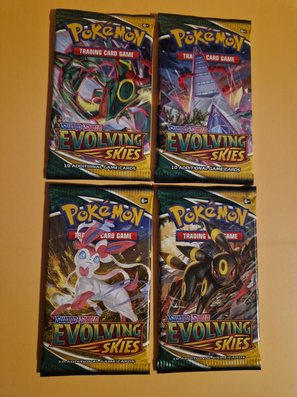 Komplett Evolving Skies artset med 4 forskjellige booster designs