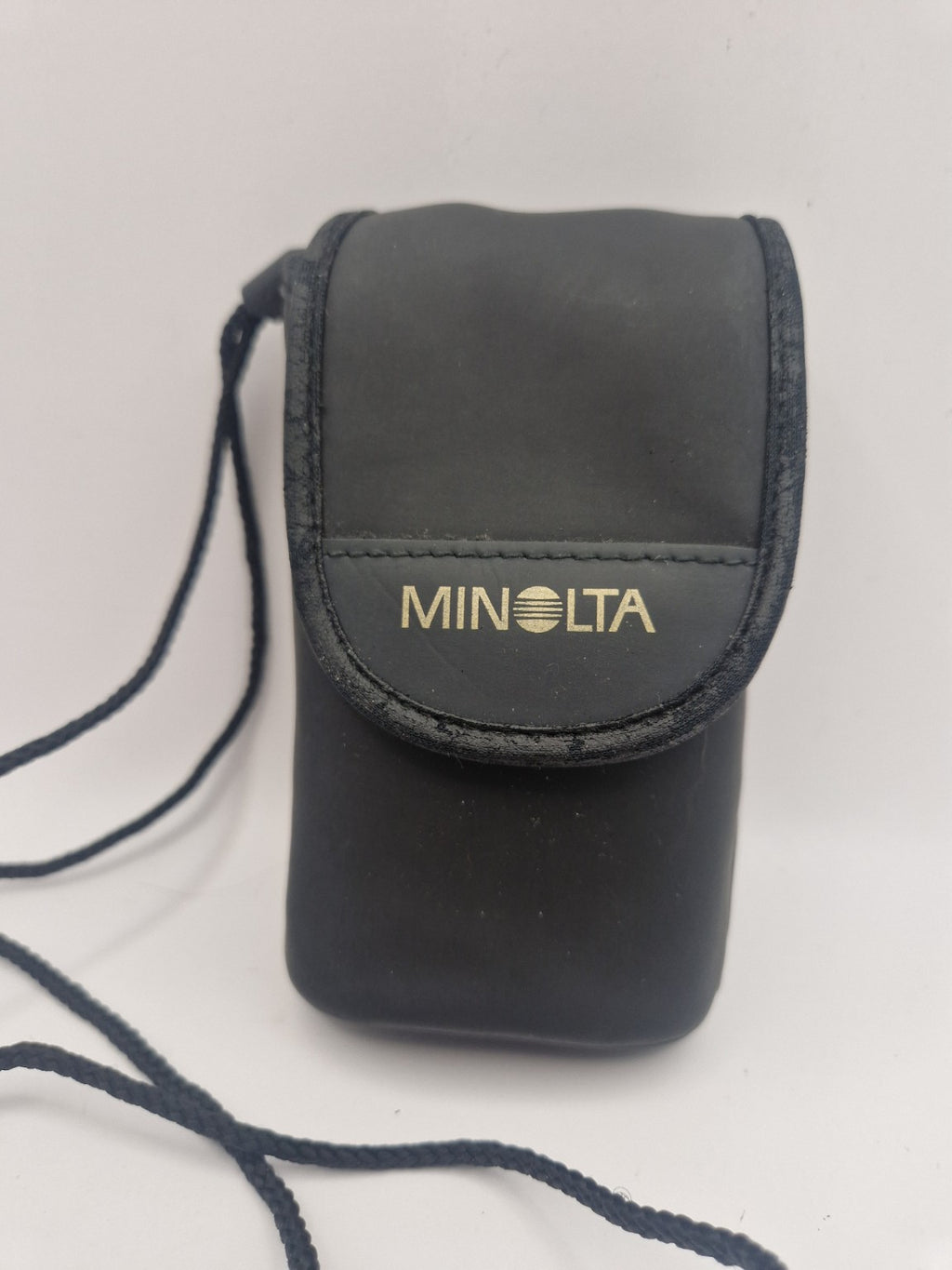 Original Minolta-bæreveske følger med.