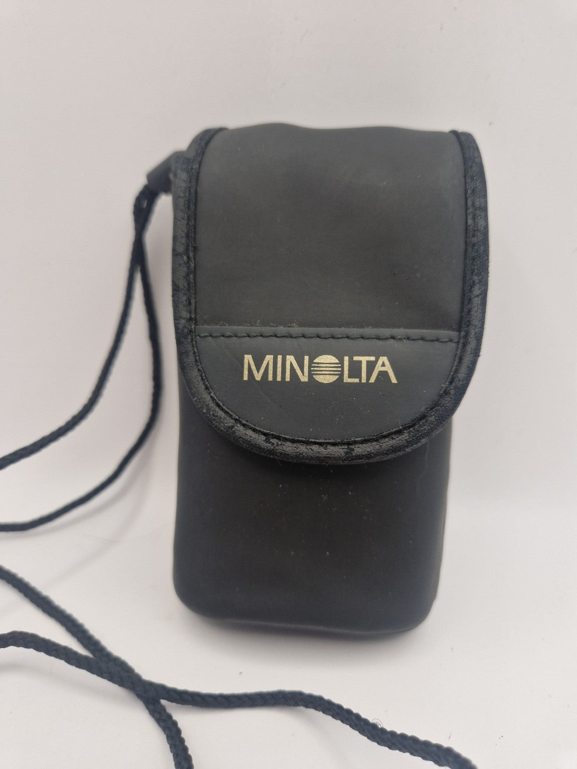 Original Minolta-bæreveske følger med.