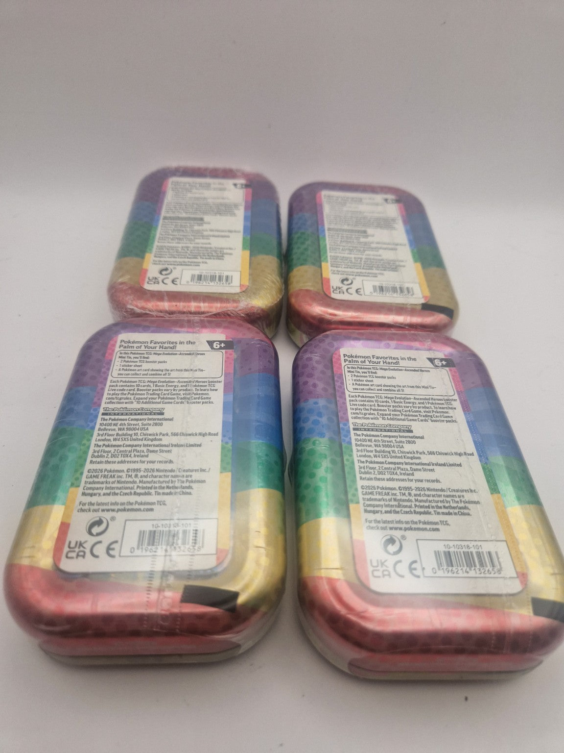 Baksiden av Mini Tins med produktinformasjon og innhold.