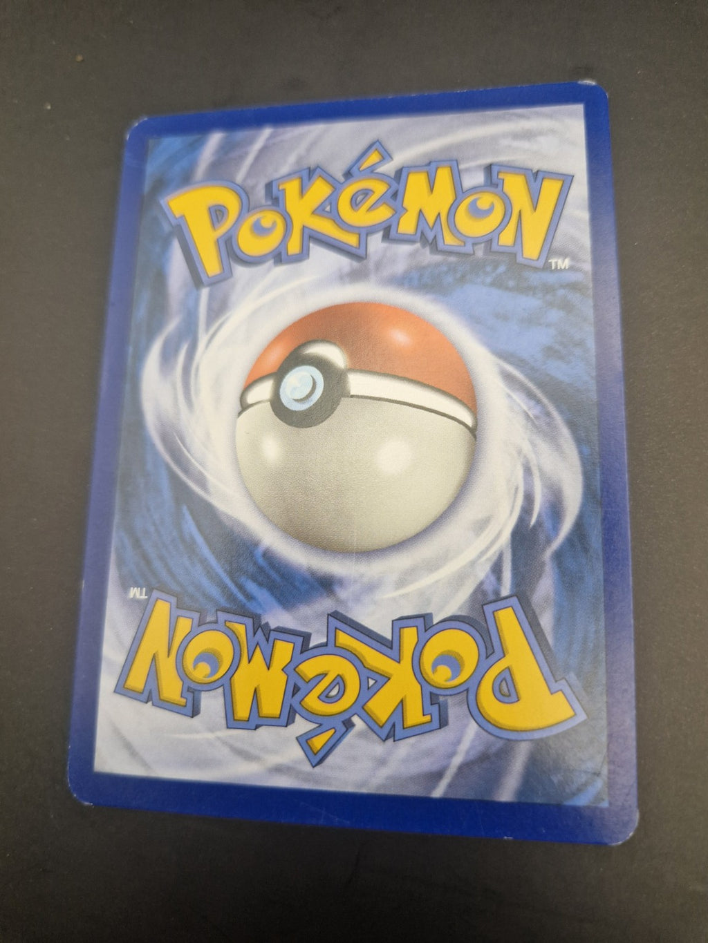 2. Bakside av Venusaur EX XY123 som viser kortets tilstand.
