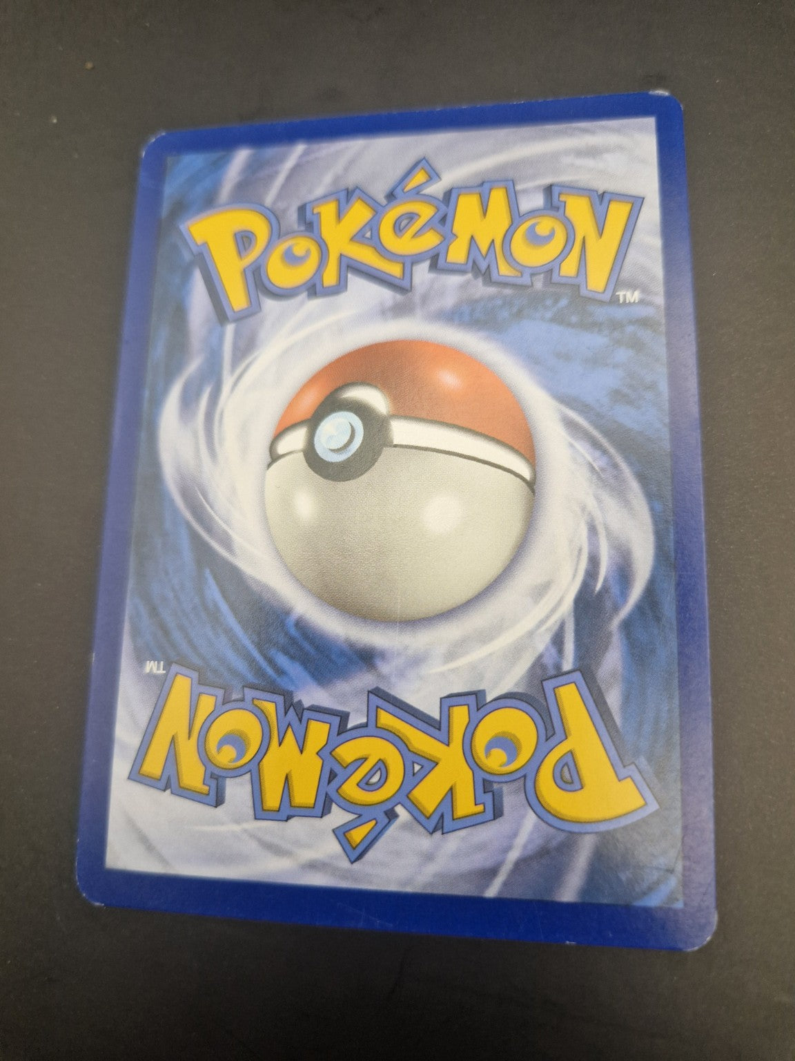 2. Bakside av Venusaur EX XY123 som viser kortets tilstand.
