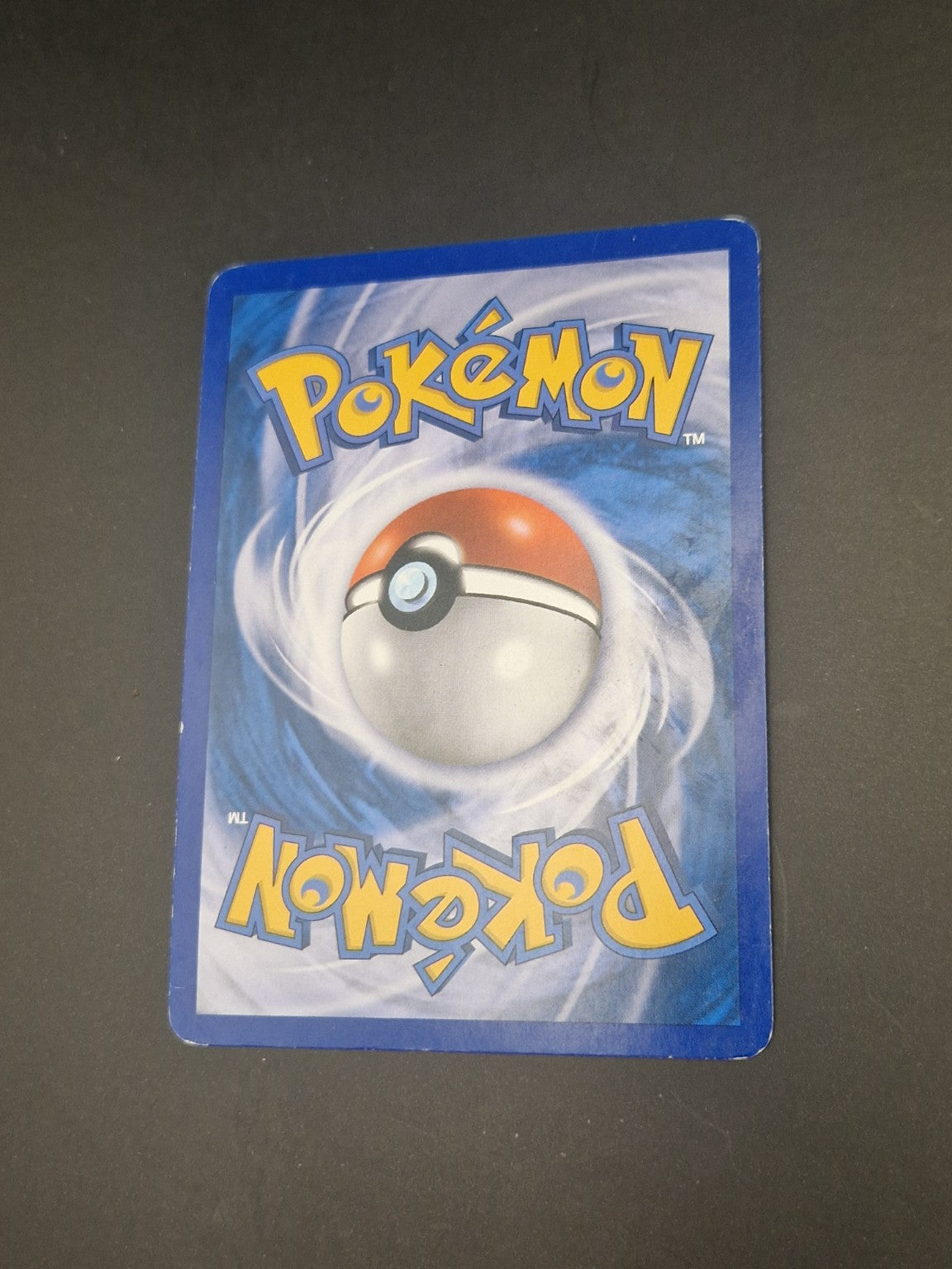 2. Bakside av Articuno 148/147 som viser kortets tilstand.
