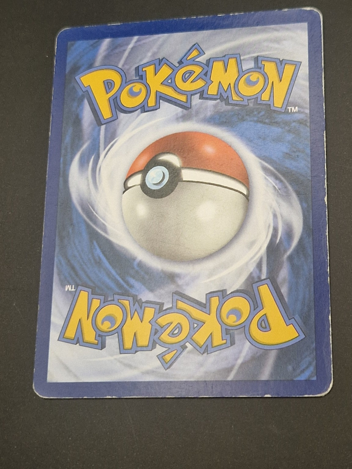2. Bakside av Rayquaza EX XY69 som viser kortets tilstand.
