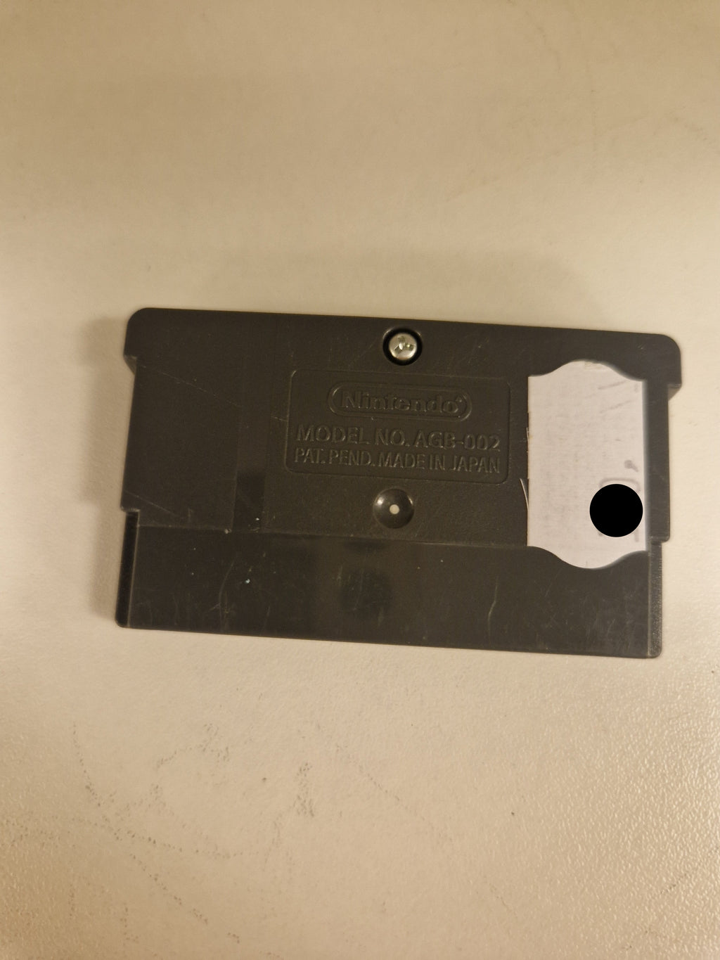 Bakside med Nintendo-merking og modellinfo