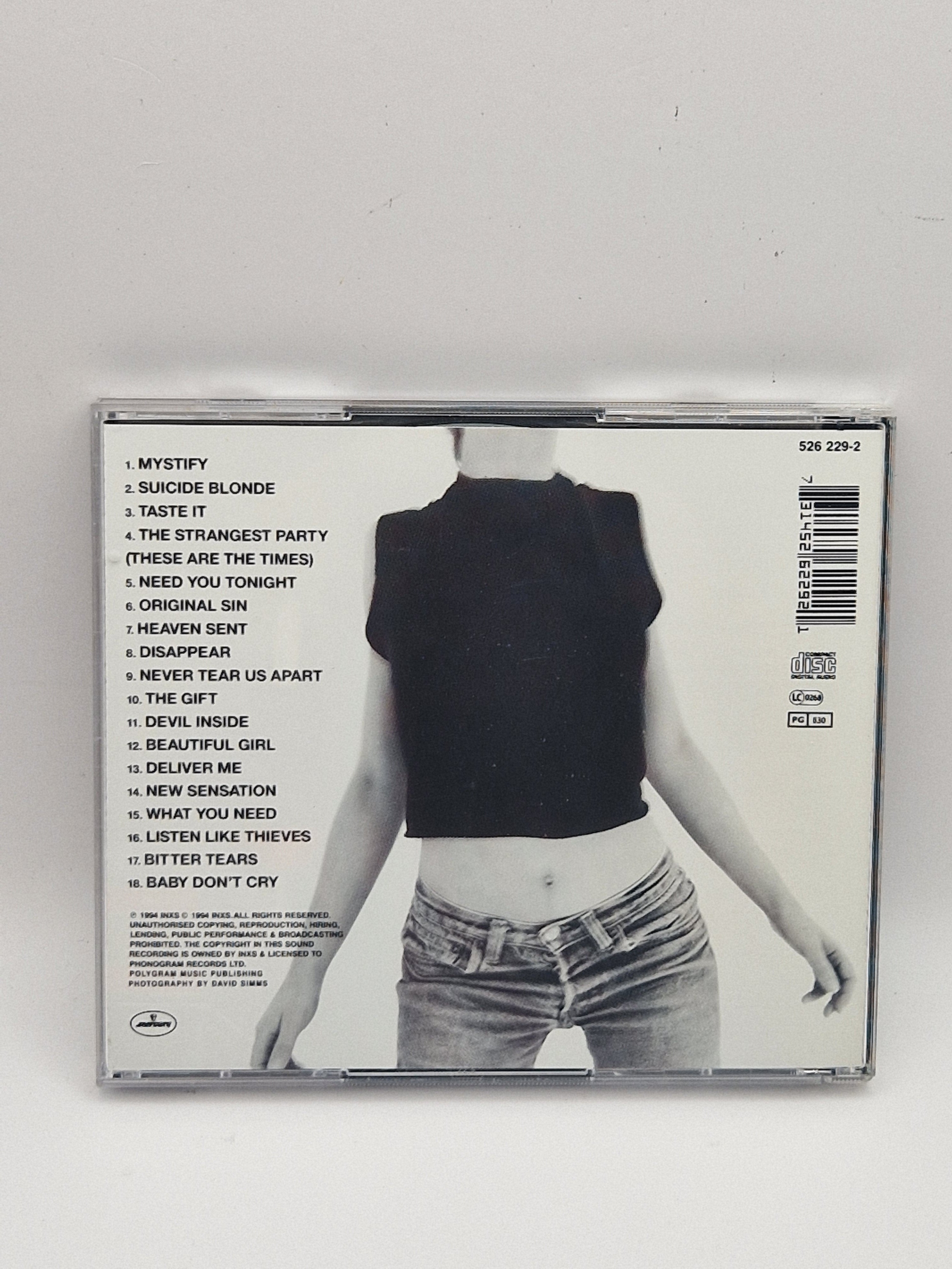 INXS – The Greatest Hits bakside med låter