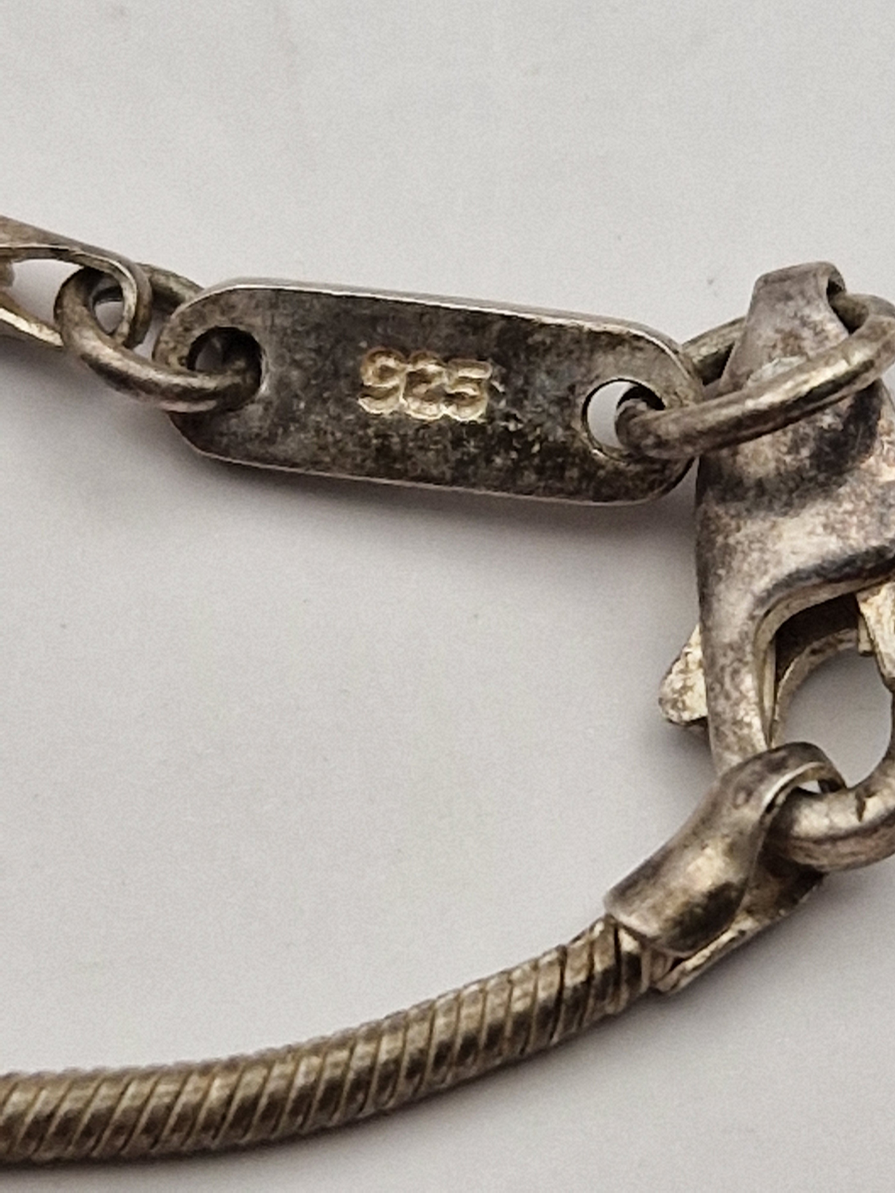 925-stempel og Esprit-merking på sølvsmykke