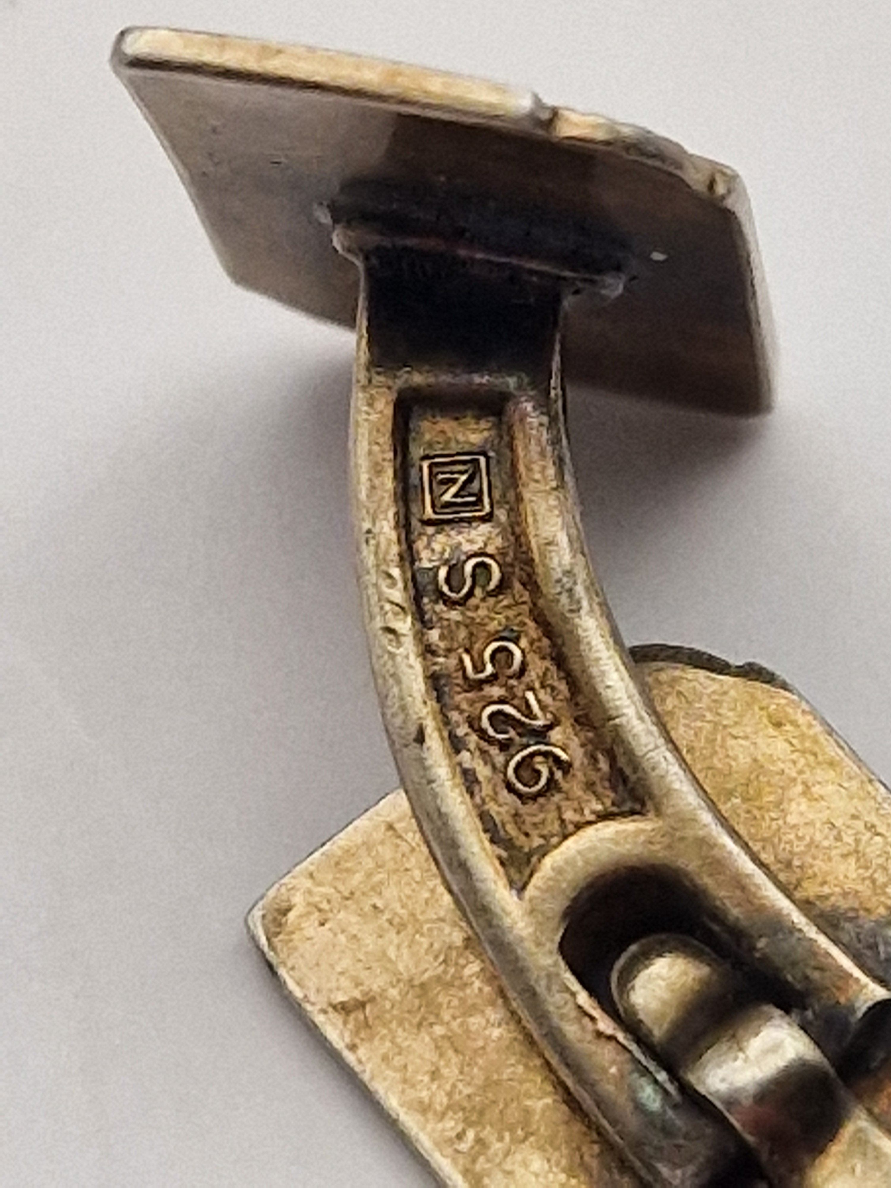 Baksiden av mansjettknapper stemplet 925