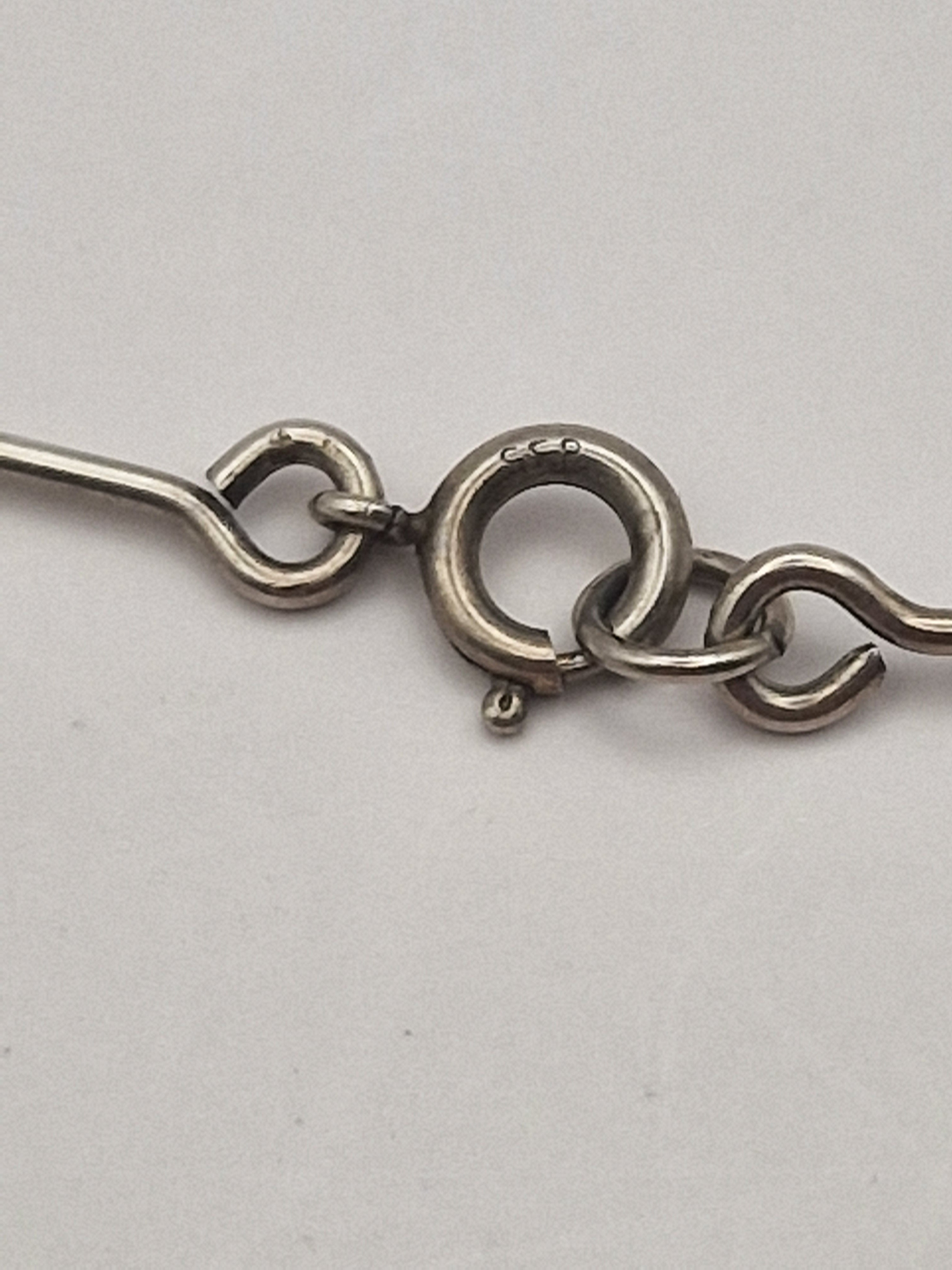 🔹 Bjørn Birkelund sølvkjede 925 – skulpturelt anheng med lilla steiner