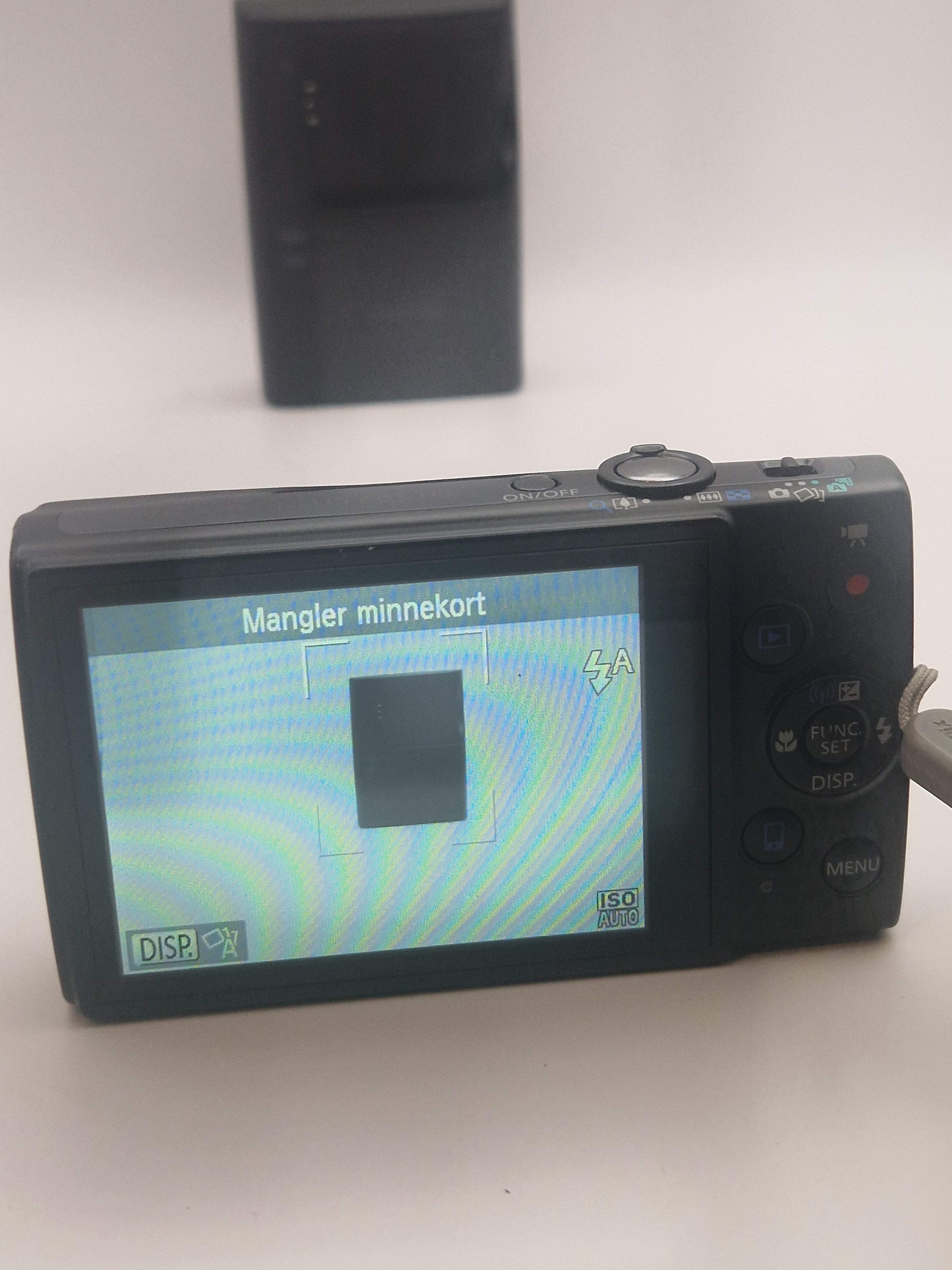 Baksiden med LCD-skjerm og betjening