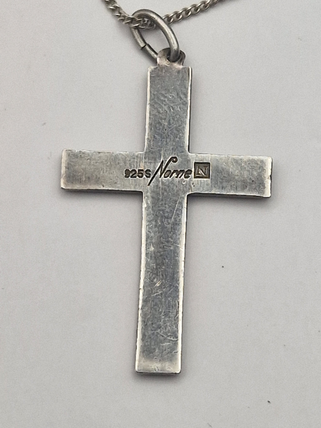 Baksiden med Norne-merke