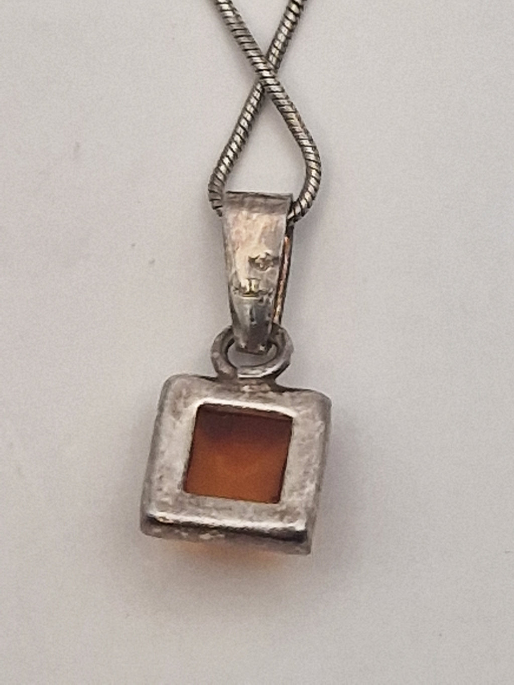 Baksiden av anhenget