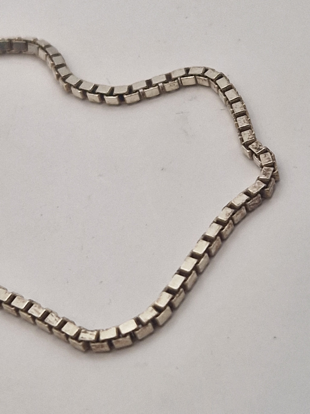 Nærbilde av box chain-ledd