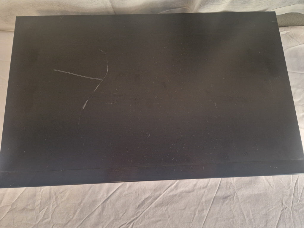 Overside med synlige bruksmerker