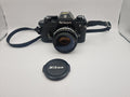 Frontvisning av Nikon EM med 50mm objektiv