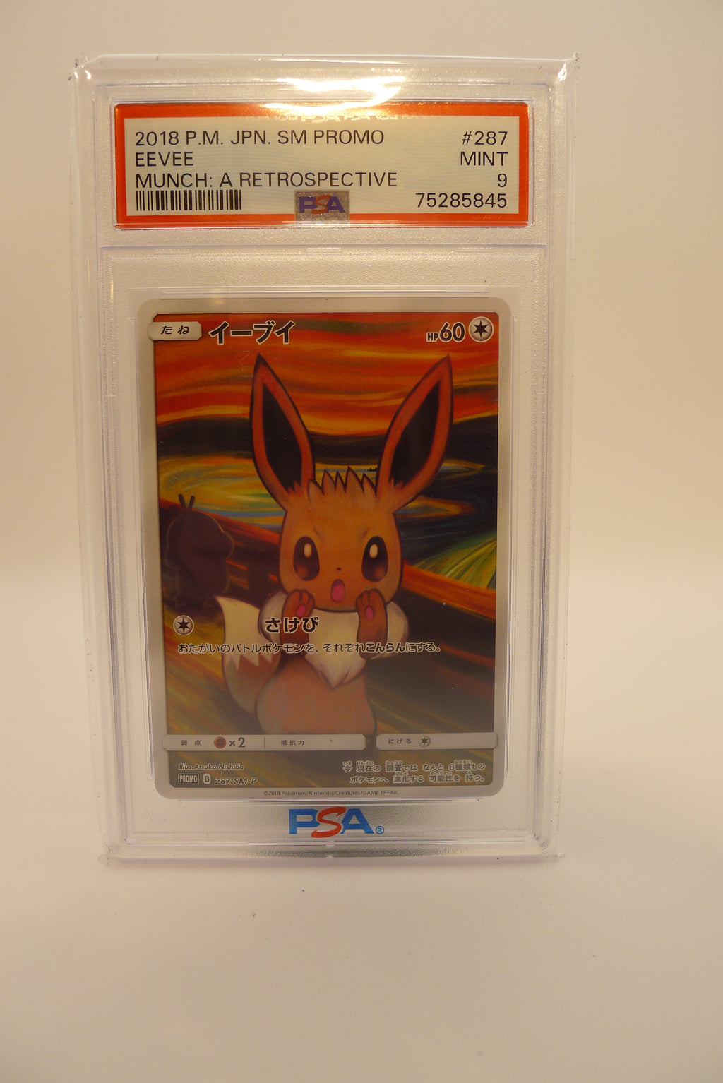 PSA 9 Mint Eevee Munch: A Retrospective japansk promo 2018 i original PSA-holder.
