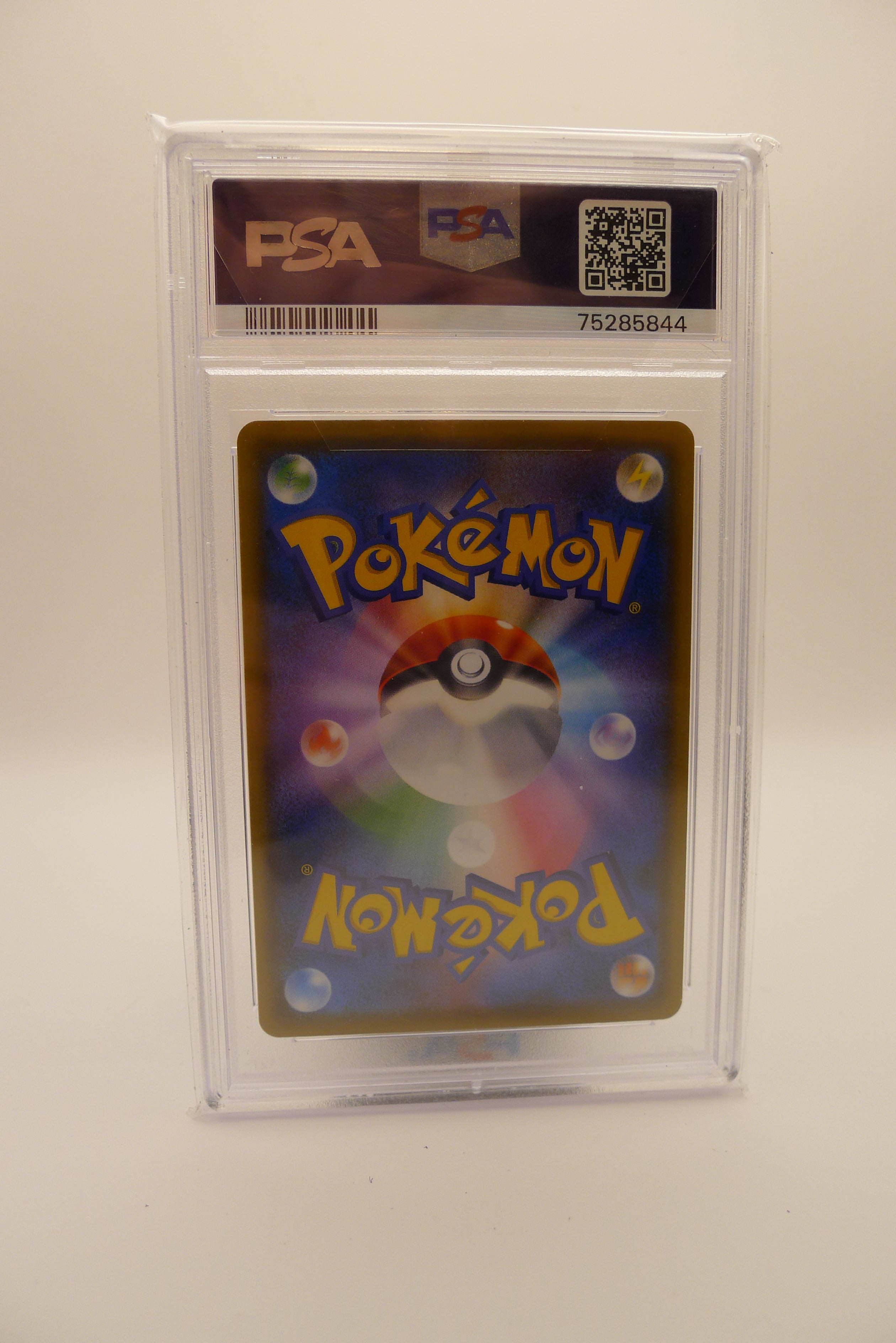 Bakside av PSA 9 Psyduck Munch promo med PSA QR-kode og serienummer.