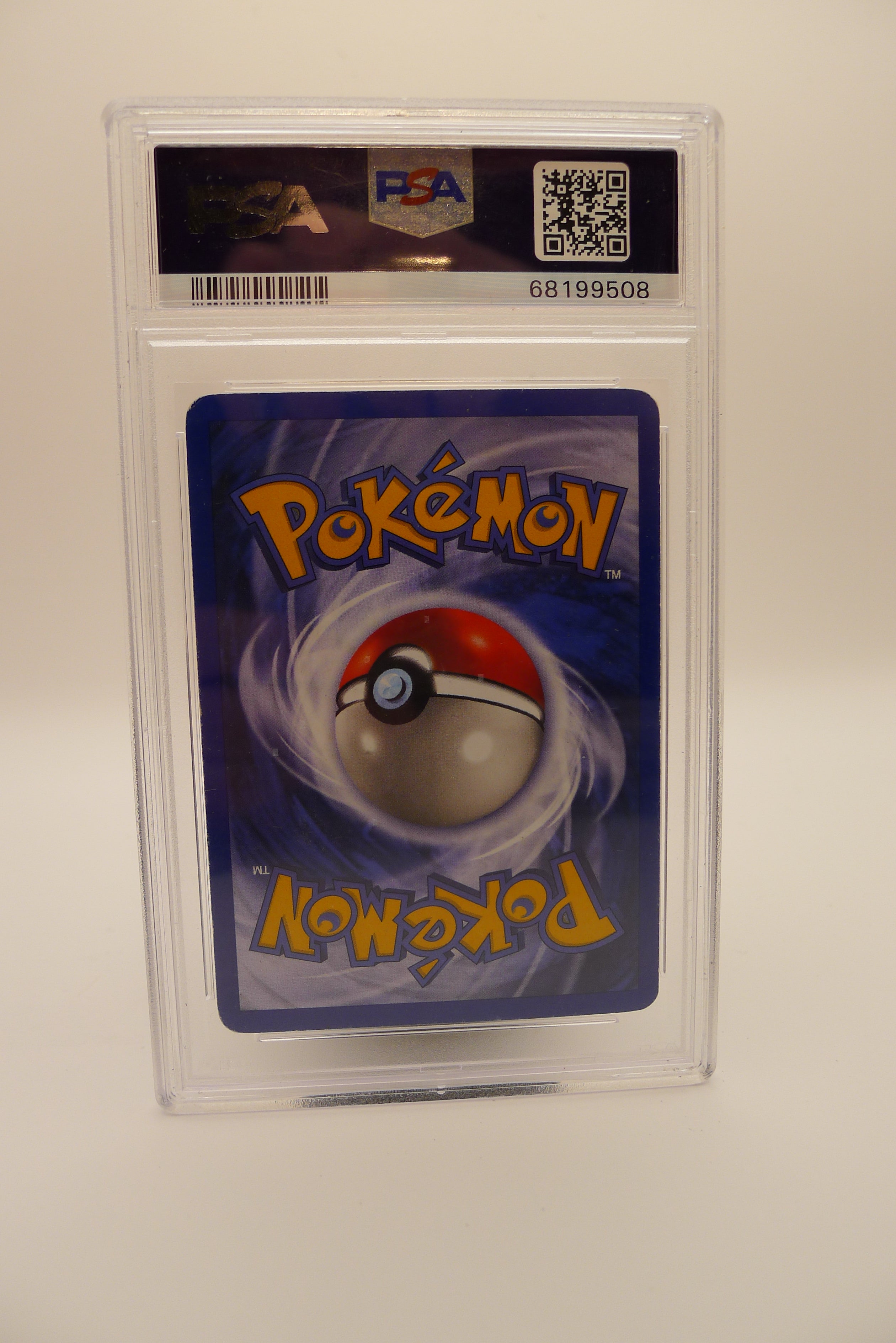 Bakside av PSA 5 Charizard Base Set 2 med PSA QR-kode.