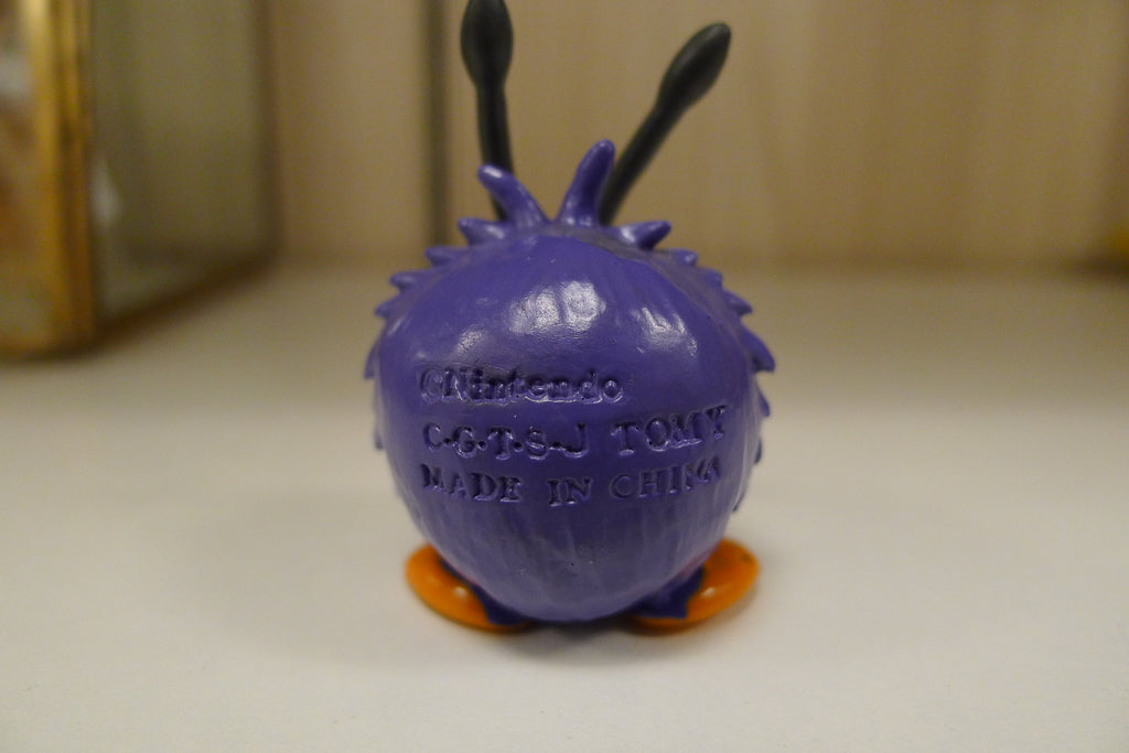 Pokémon Venonat samlerfigur – bakside med stempel