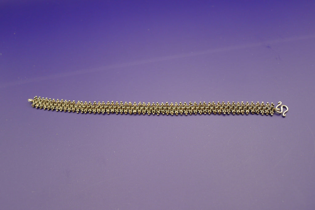 Vintage armbånd i 925 sterling sølv med etnisk filigran-design, mørknet finish.